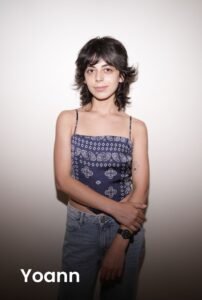 A professional portrait of tattoo artist Yoann