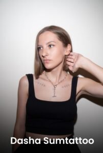 A portrait of tattoo artist Dasha Sumtattoos at Names Tattoo Studio in Lisbon