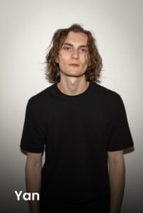 A professional portrait of tattoo artist Yan at Names Tattoo Studio in Lisbon