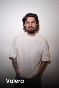 A professional portrait of tattoo artist Valera at Names Tattoo Studio in Lisbon