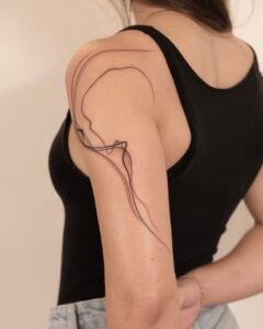 Intricate geometric mandala shoulder tattoo with dotwork and fine line details at Names Tattoo Studio in Lisbon