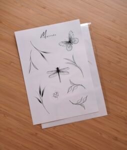 Fine line butterfly, dragonfly, and ladybug tattoo flashes with delicate leaves