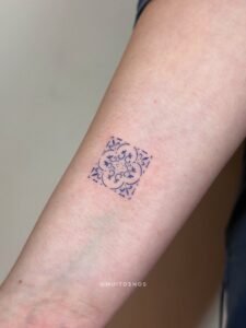 Intricate geometric mandala shoulder tattoo with dotwork and fine line details at Names Tattoo Studio in Lisbon