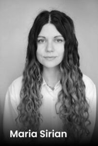 A professional portrait of tattoo artist Maria Sirian at Names Tattoo Studio in Lisbon