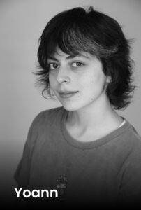 A professional portrait of tattoo artist Yoann